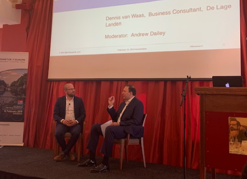 Andrew Dailey and Dennis van Waas on stage discussing pricing and billing of services